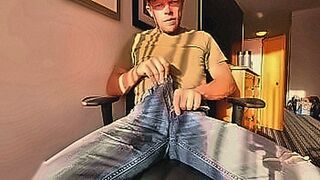 Premium Content Wetting jeans in front of a hotel window — | topless jeans | is full of electric tension