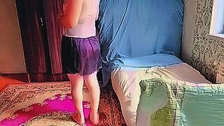 Hot Alert Playful sissy holding pastel gift box with smile — | ghettodoorway | delivers edge-to-edge excitement